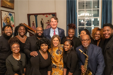 The Governor and First Lady pose with a group of college students from Virginia State University's Gospel Chorale.