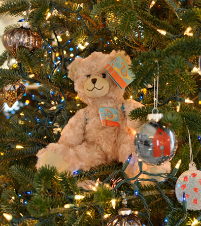 holiday bear on mansion tree