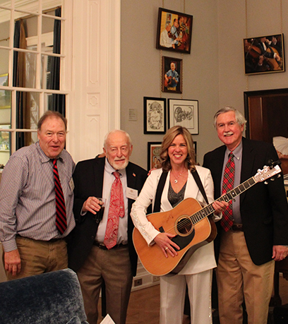 From left to right: Don Park, Charlie McConnell, Suzanne S. Youngkin (holding a guitar), Dick Hickman.