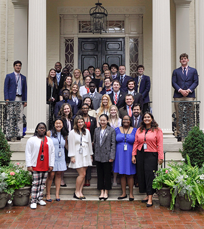 The 2023 cohort of Virginia Governor's Fellows stands together on the steps of the Executive Mansion.