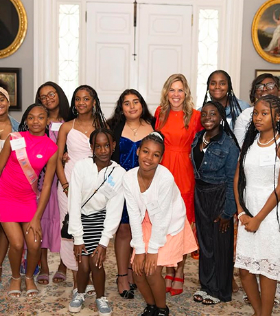 a group of young girls with the First Lady