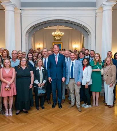 group of teachers with the Governor