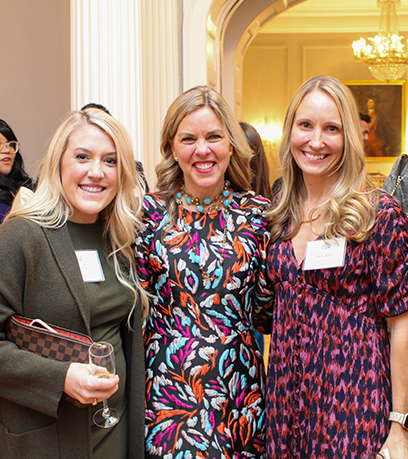 First Lady Suzanne S. Youngkin poses with two women.