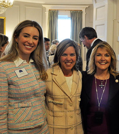 The First Lady of Virginia poses with Secretary of Commerce and Trade, Caren Merrick and a female entrepreneur.